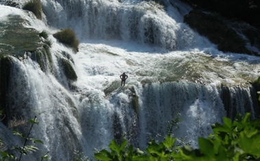 This photo depicting the ultimate in eco travel ... a gentleman standing at the top of the Krka Falls in Croatia (By the way, how did he get there and where does he go from there?  He is wearing a swimsuit!) ... was taken by Dr. Zsolt Zatrok from Albertirsa, Hungary.